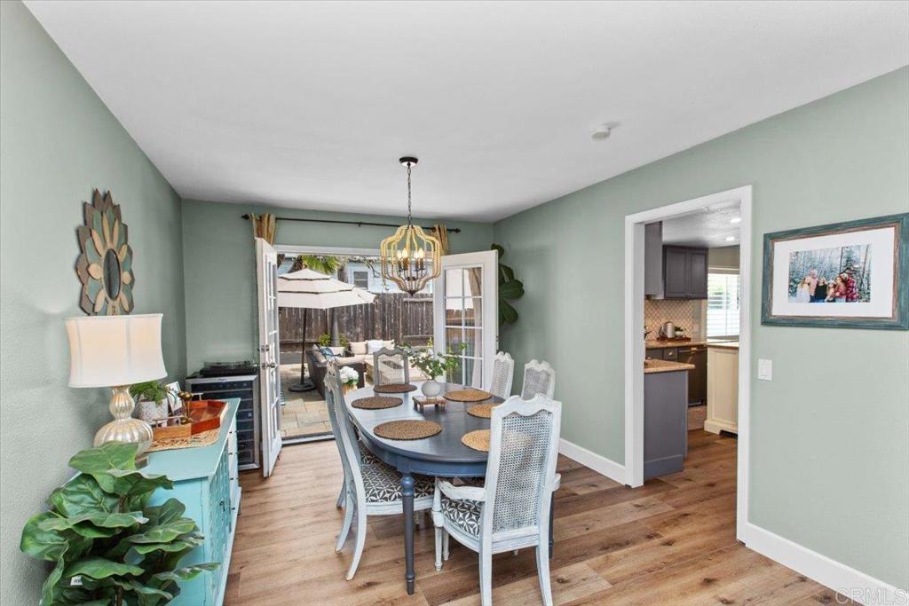 1480 Kurtz Street Oceanside, CA 92054 - Photo 11 of 31 a view of a dining room with furniture window and wooden floor