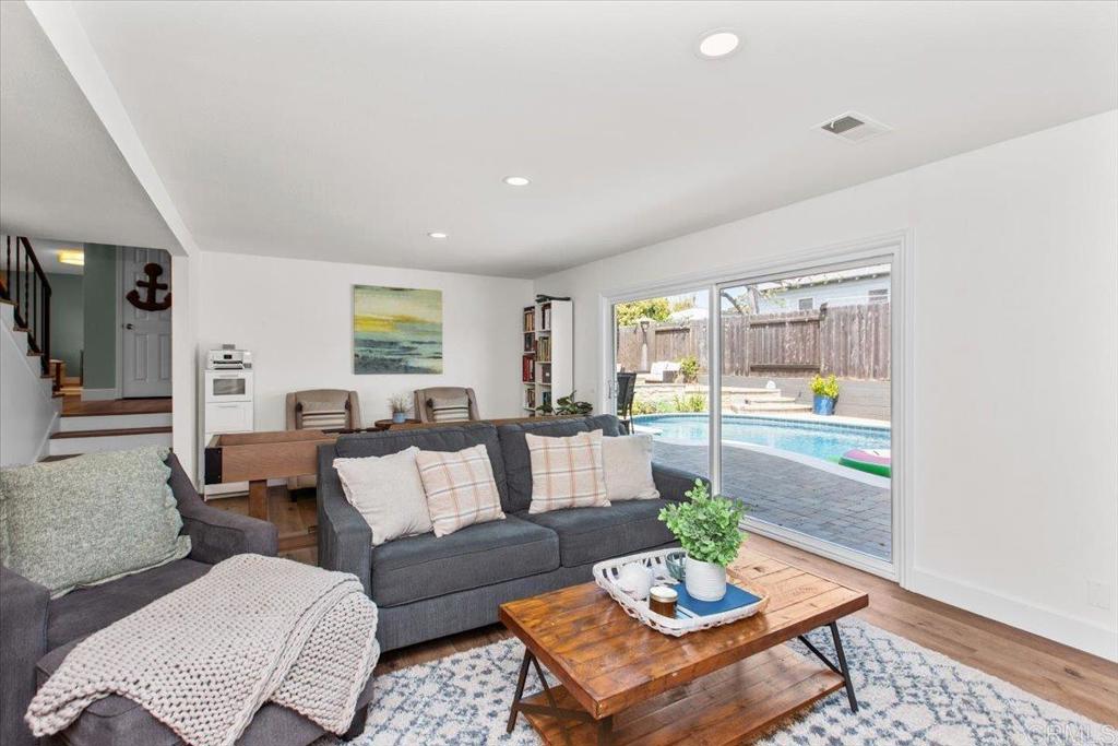 1480 Kurtz Street Oceanside, CA 92054 - Photo 16 of 31 a living room with furniture and a large window