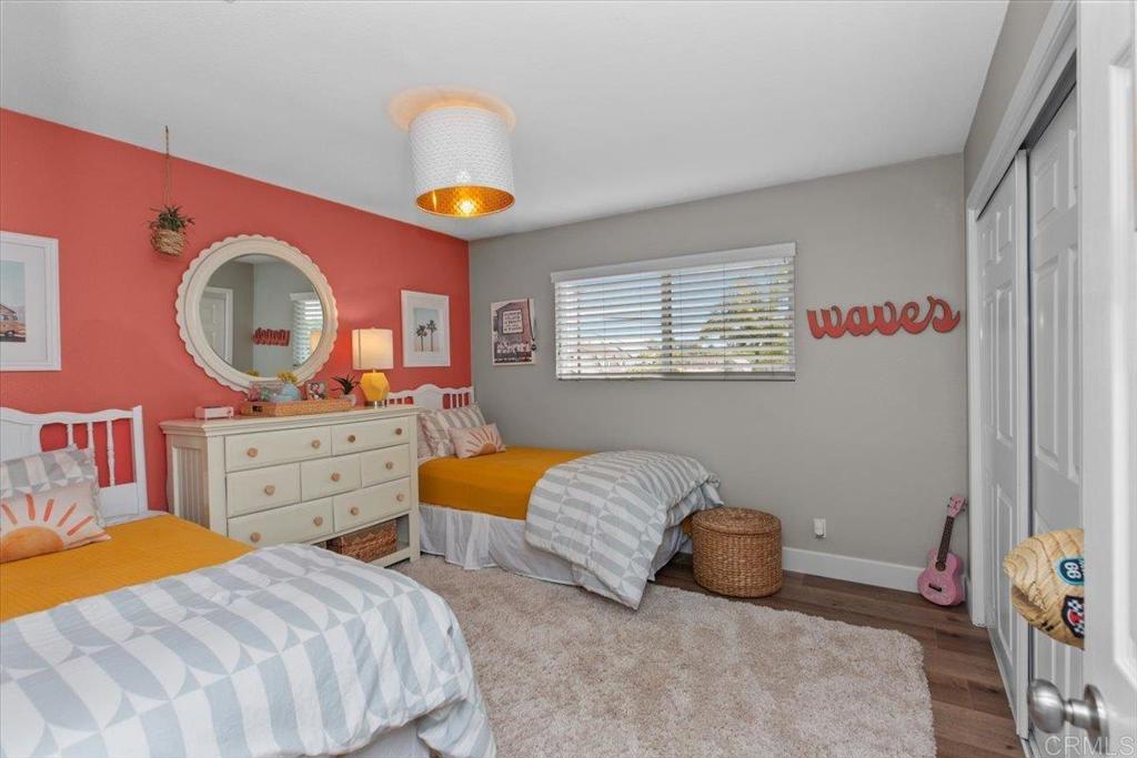1480 Kurtz Street Oceanside, CA 92054 - Photo 21 of 31 a bedroom with a bed and a dresser