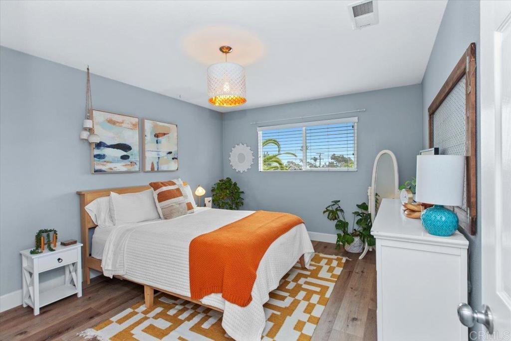 1480 Kurtz Street Oceanside, CA 92054 - Photo 22 of 31 a bedroom with bed and window