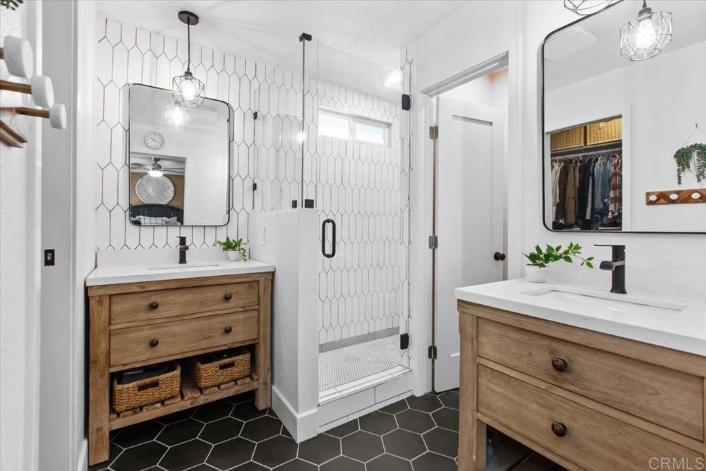 1480 Kurtz Street Oceanside, CA 92054 - Photo 25 of 31 a bathroom with a double vanity sink mirror and double