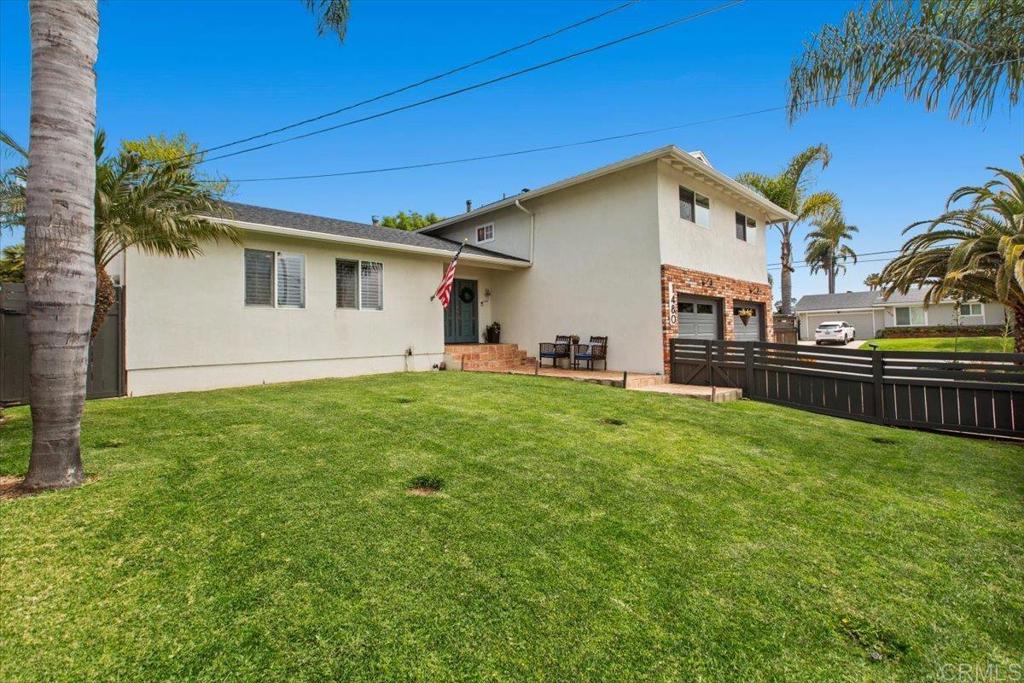 1480 Kurtz Street Oceanside, CA 92054 - Photo 3 of 31 a view of a house with a yard and tree s