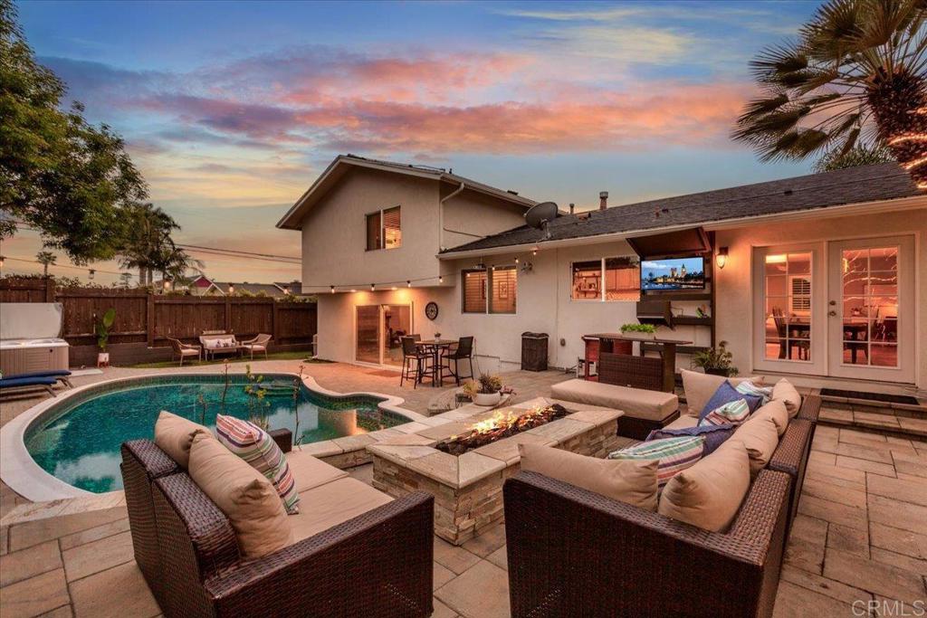 1480 Kurtz Street Oceanside, CA 92054 - Photo 4 of 31 a view of a patio with couches chairs dining table and chairs with the ocean view
