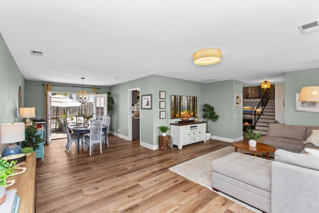 1480 Kurtz Street Oceanside, CA 92054 - Photo 10 of 31 a living room with furniture and a wooden floor