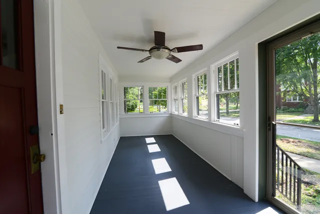 a view of hallway with windows