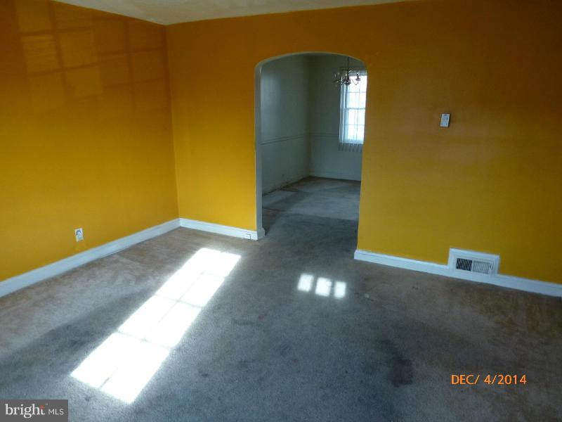 832 Benninghaus Road Baltimore, MD 21212 - Photo 5 of 14 a view of empty room with wooden floor