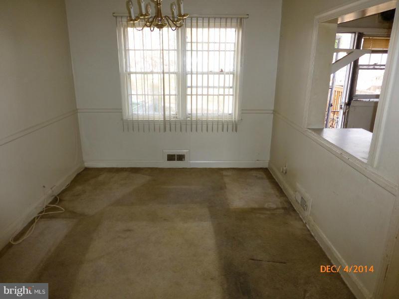832 Benninghaus Road Baltimore, MD 21212 - Photo 8 of 14 an empty room with a empty space and windows