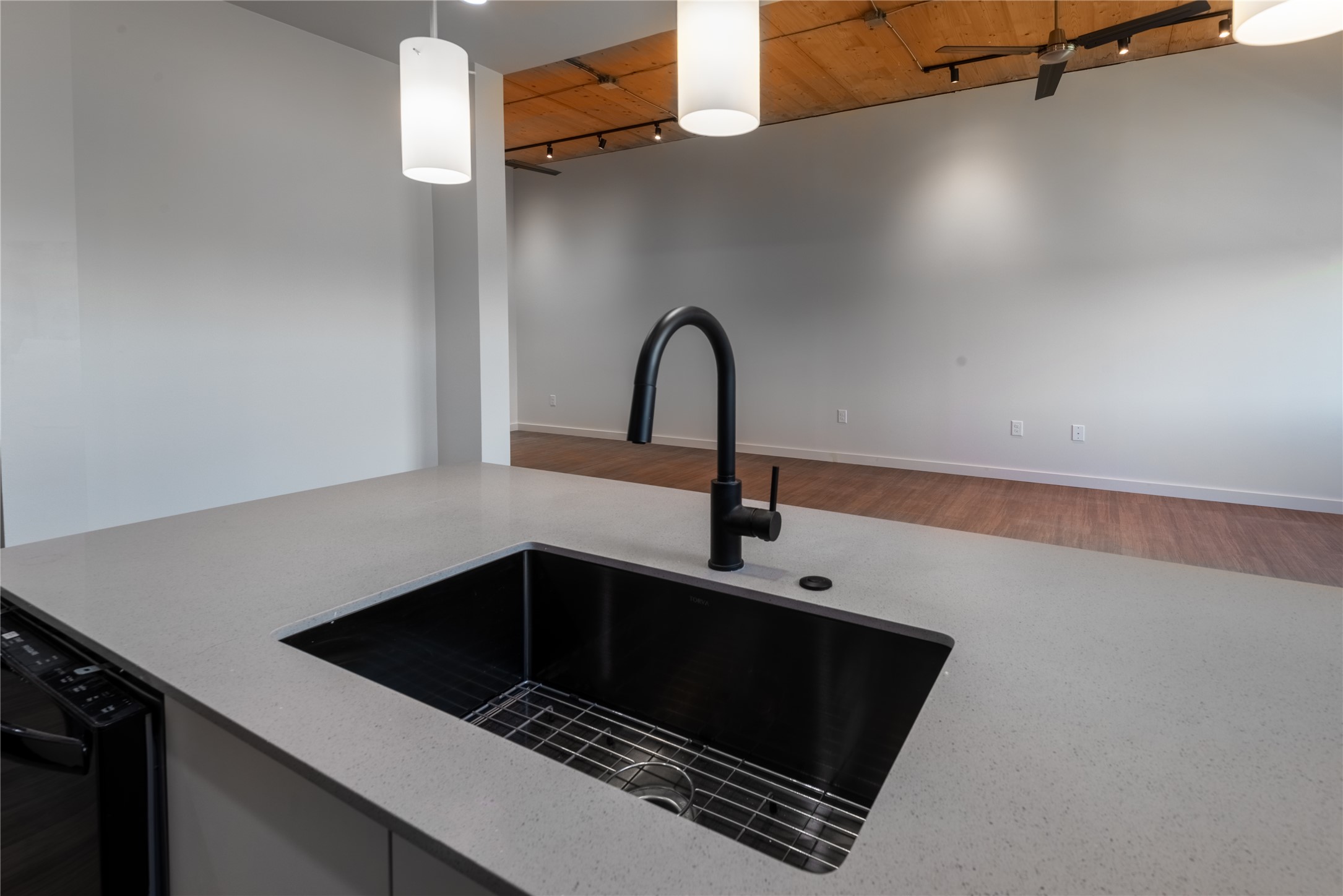 3515 Webberville Road, Unit VISTA Austin, TX 78702 - Photo 5 of 22 a close view of a sink a counter space and a stove in a room
