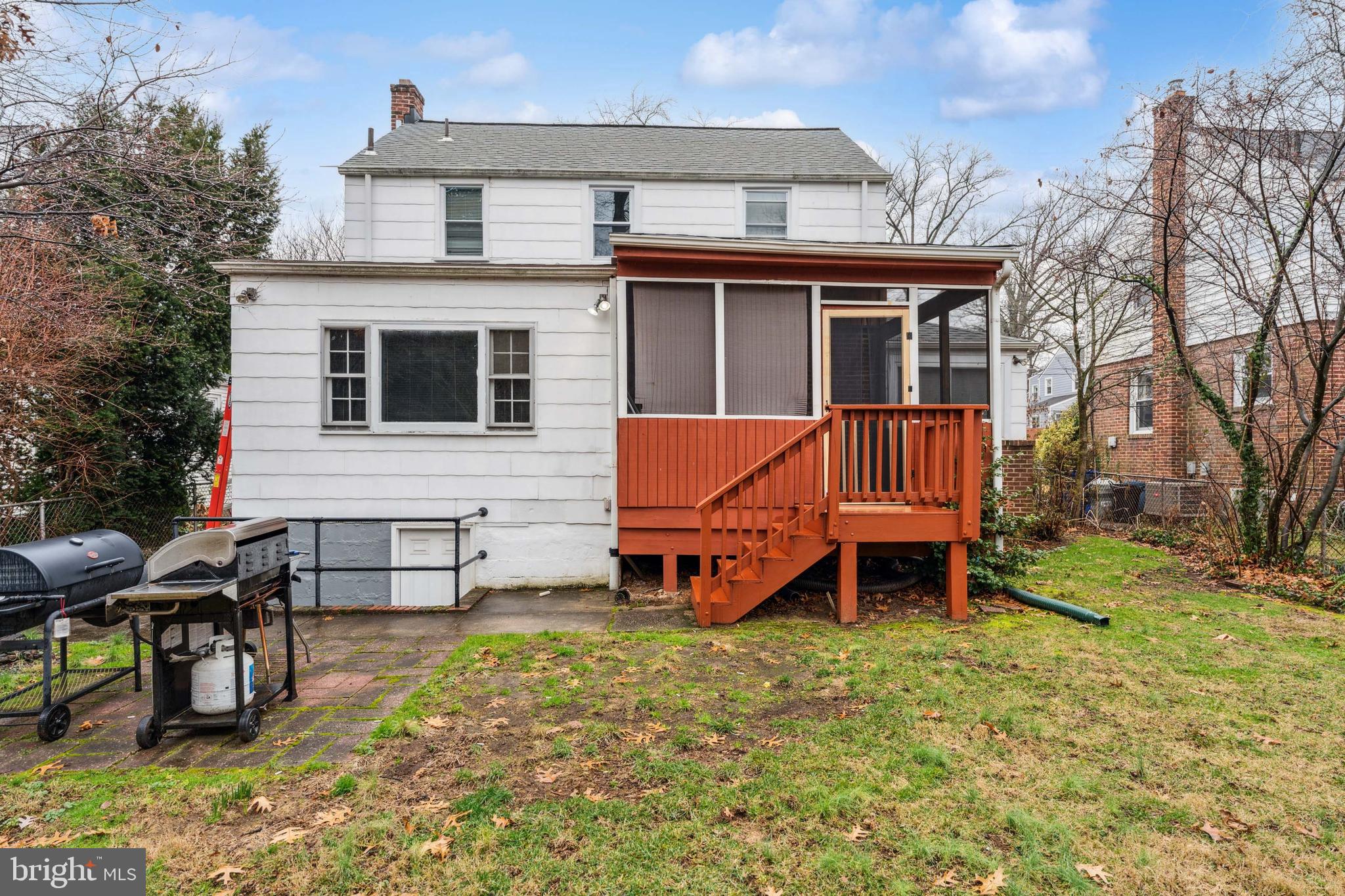 9222 Glenville Road Silver Spring, MD 20901 - Photo 15 of 15 a view of a house with a yard and sitting area
