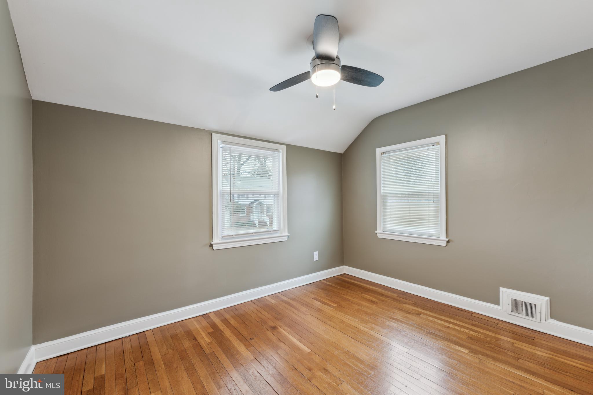 9222 Glenville Road Silver Spring, MD 20901 - Photo 5 of 15 a view of empty room with wooden floor