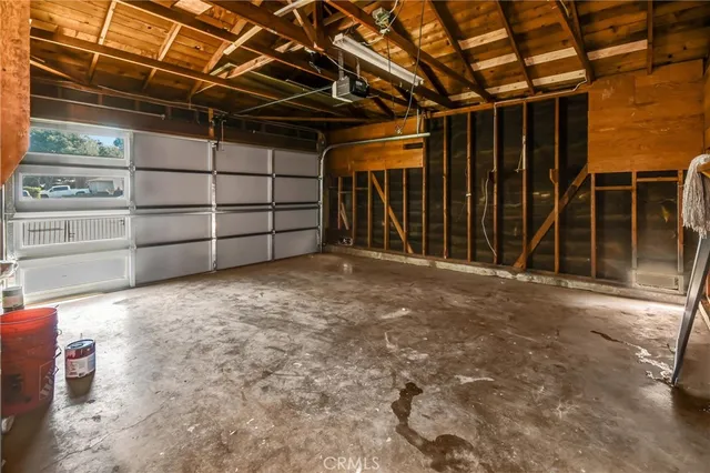 a view of an empty room with storage