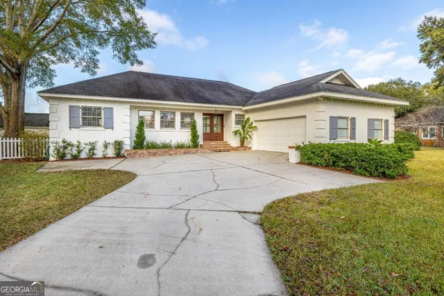 a front view of house with swimming pool