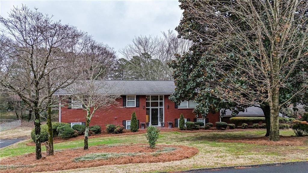 200 Cherry Hill Circle Calhoun, GA 30701 - Photo 2 of 61 a view of a town with large trees