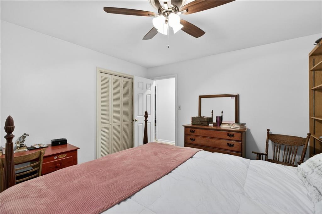 200 Cherry Hill Circle Calhoun, GA 30701 - Photo 27 of 61 a bedroom with a bed and a dresser