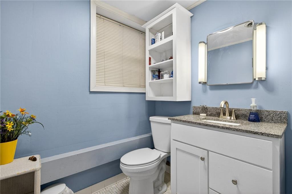 200 Cherry Hill Circle Calhoun, GA 30701 - Photo 44 of 61 a bathroom with a sink toilet and mirror