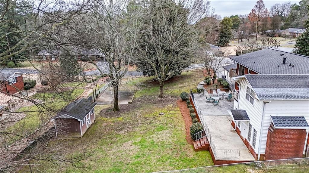 200 Cherry Hill Circle Calhoun, GA 30701 - Photo 58 of 61 an aerial view of a house with swimming pool and large trees