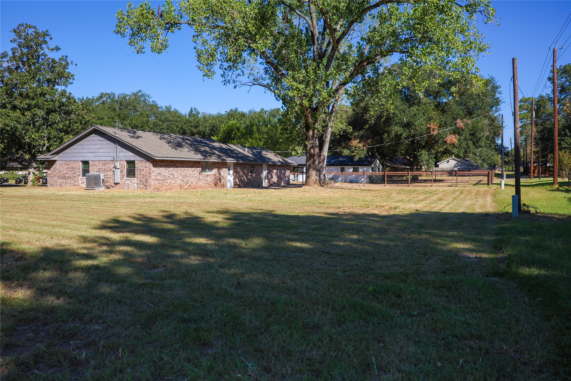1926 16th Street Hempstead, TX 77445 - Photo 2 of 19 a view of a house with a big yard