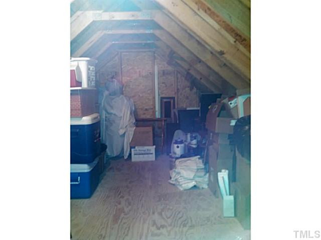 9525 Brookchase Drive Raleigh, NC 27617 - Photo 25 of 25 Walk-in storage accessible from Bedroom Closet Storage