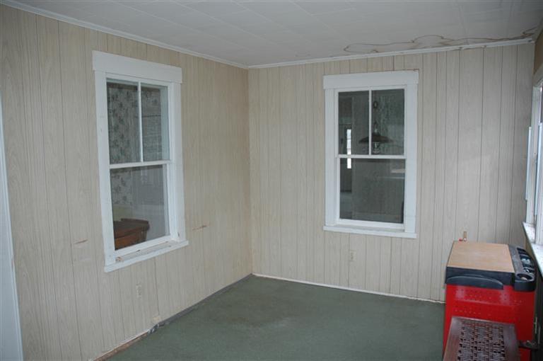 142 Shore Road Bourne, MA 02532 - Photo 17 of 35 an empty room with windows