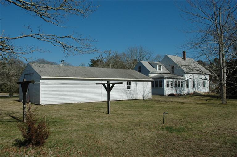 142 Shore Road Bourne, MA 02532 - Photo 8 of 35 a house view with a outdoor space