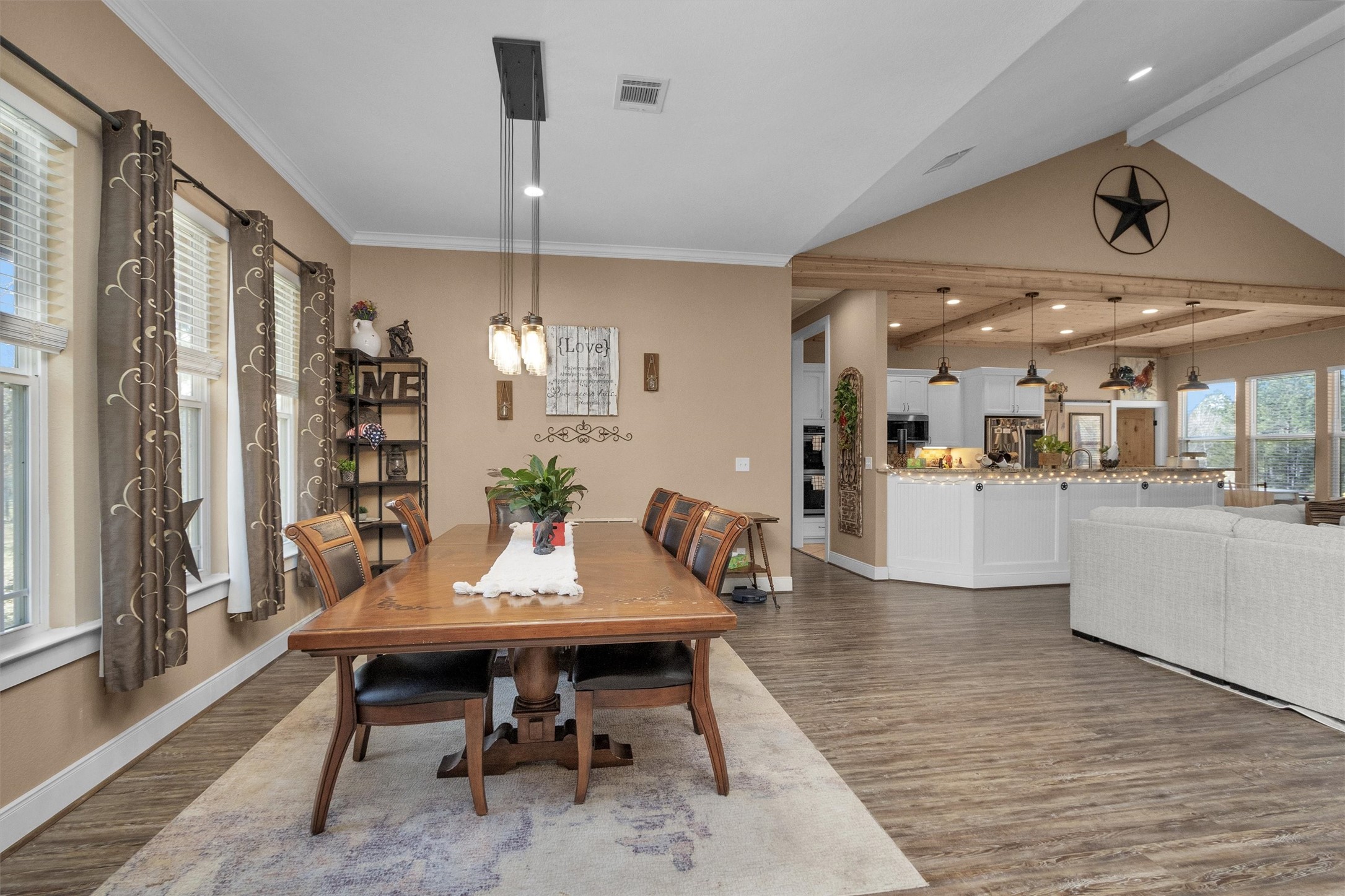 12225 High Fire Road Montgomery, TX 77356 - Photo 12 of 45 a view of a dining room with furniture window and wooden floor