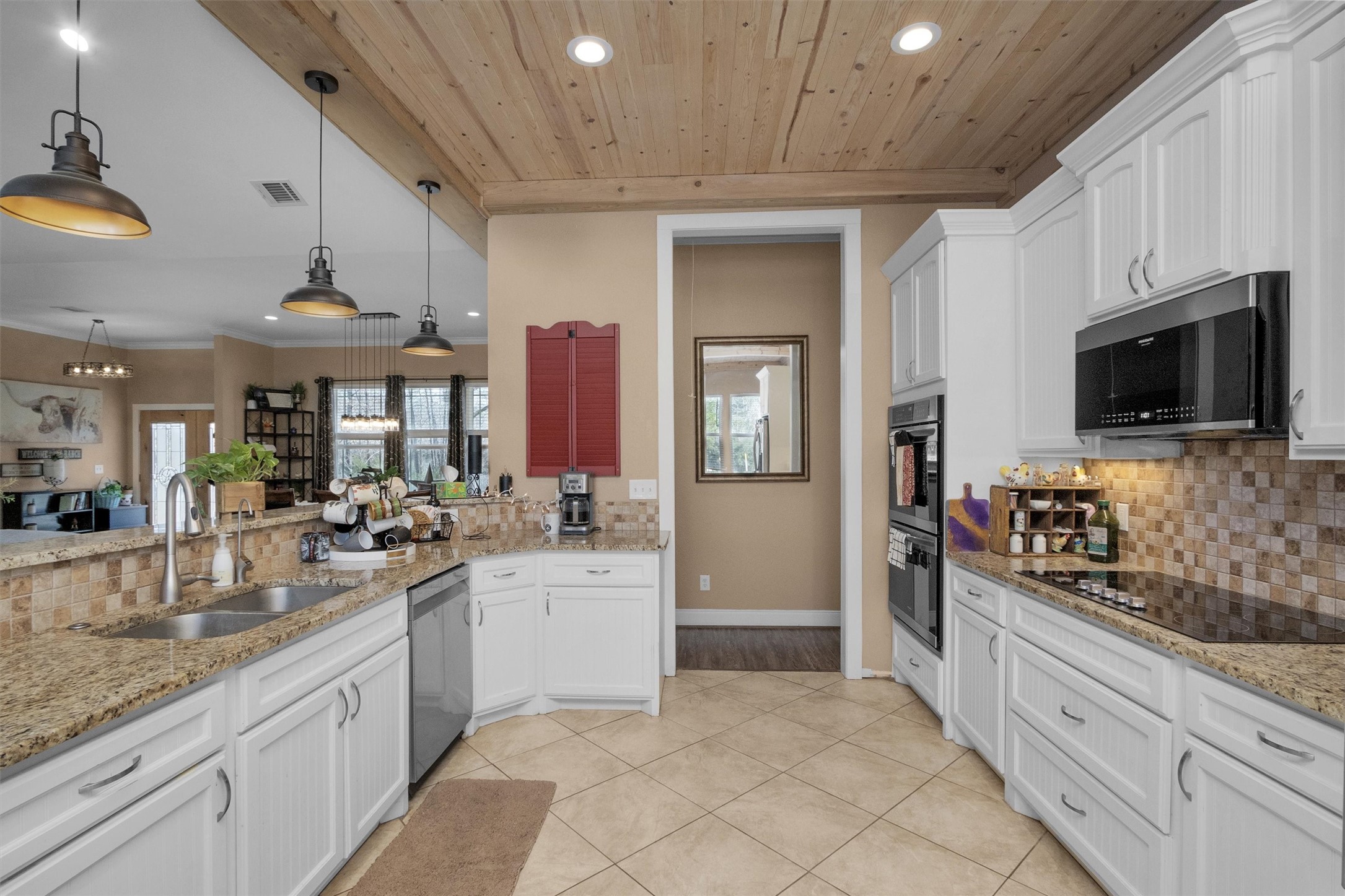 12225 High Fire Road Montgomery, TX 77356 - Photo 18 of 45 a large kitchen with cabinets