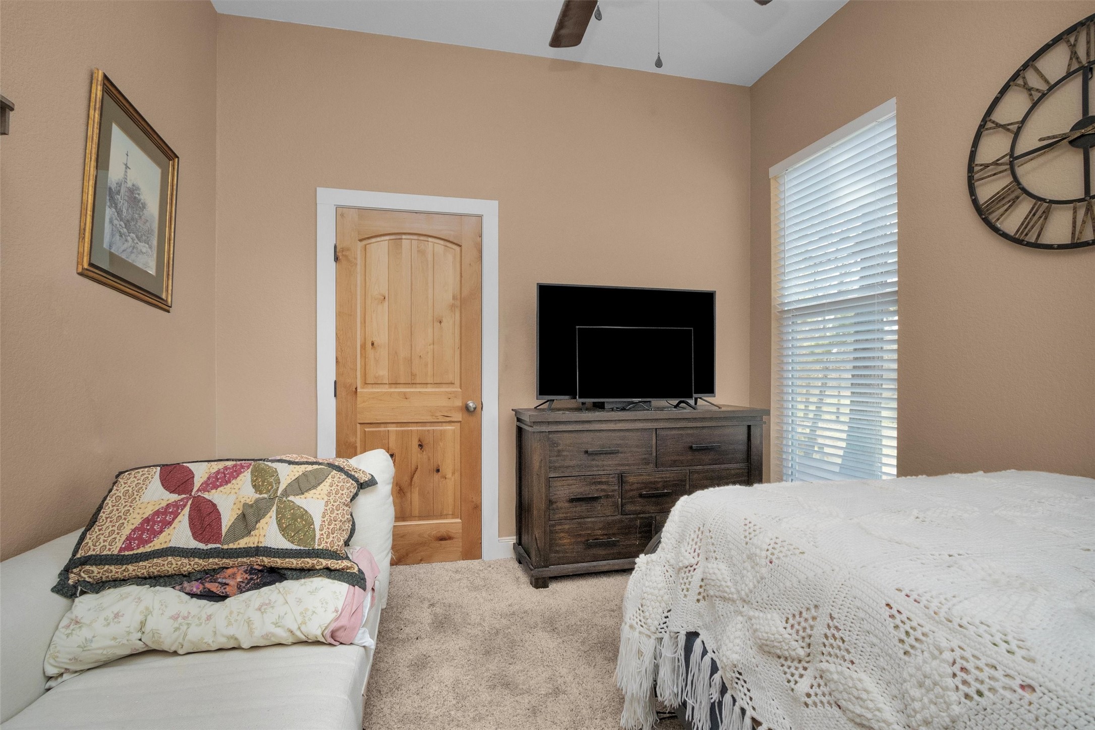 12225 High Fire Road Montgomery, TX 77356 - Photo 33 of 45 a bedroom with a bed and a flat screen tv