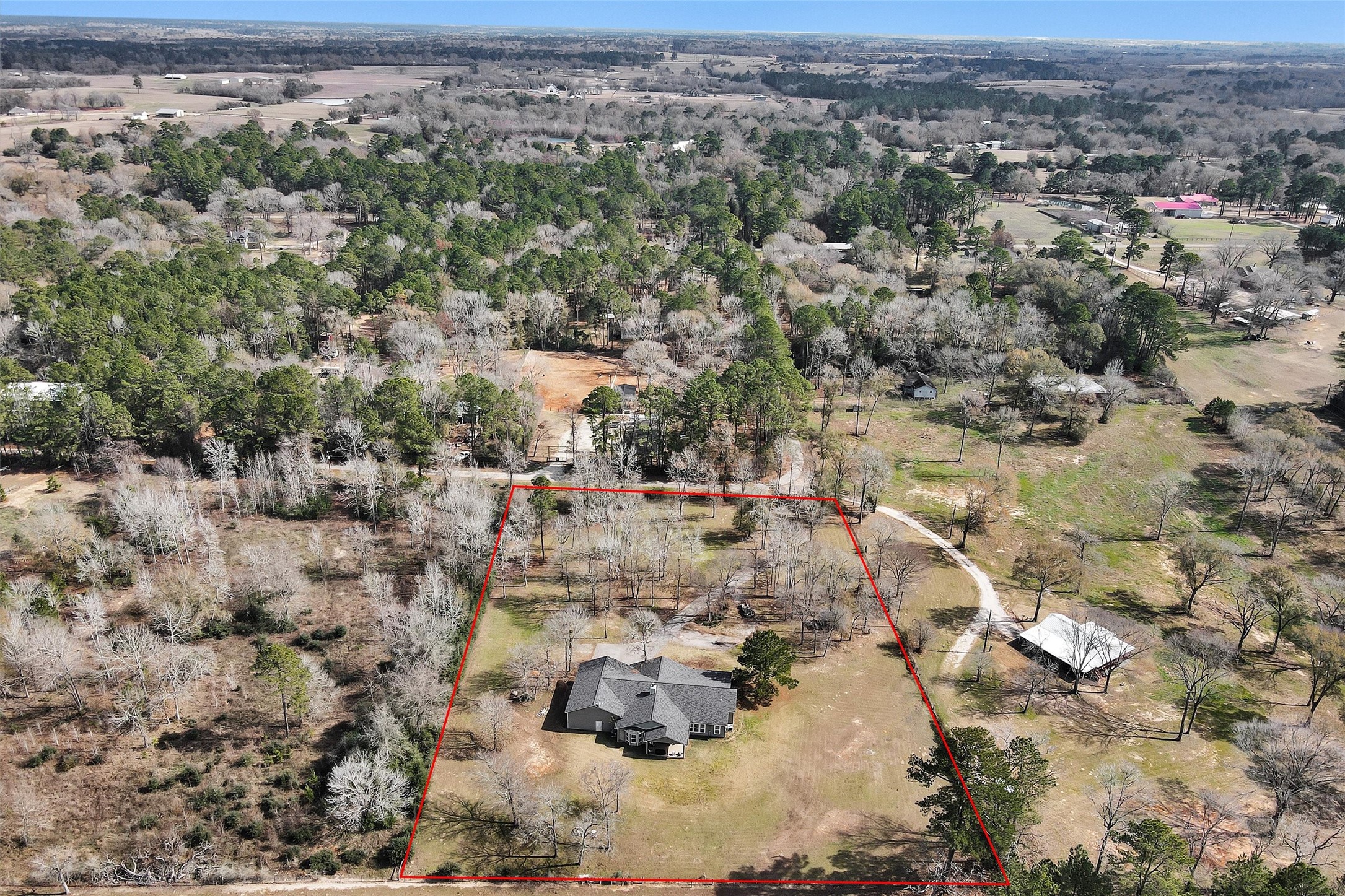 12225 High Fire Road Montgomery, TX 77356 - Photo 43 of 45 an aerial view of residential houses with outdoor space
