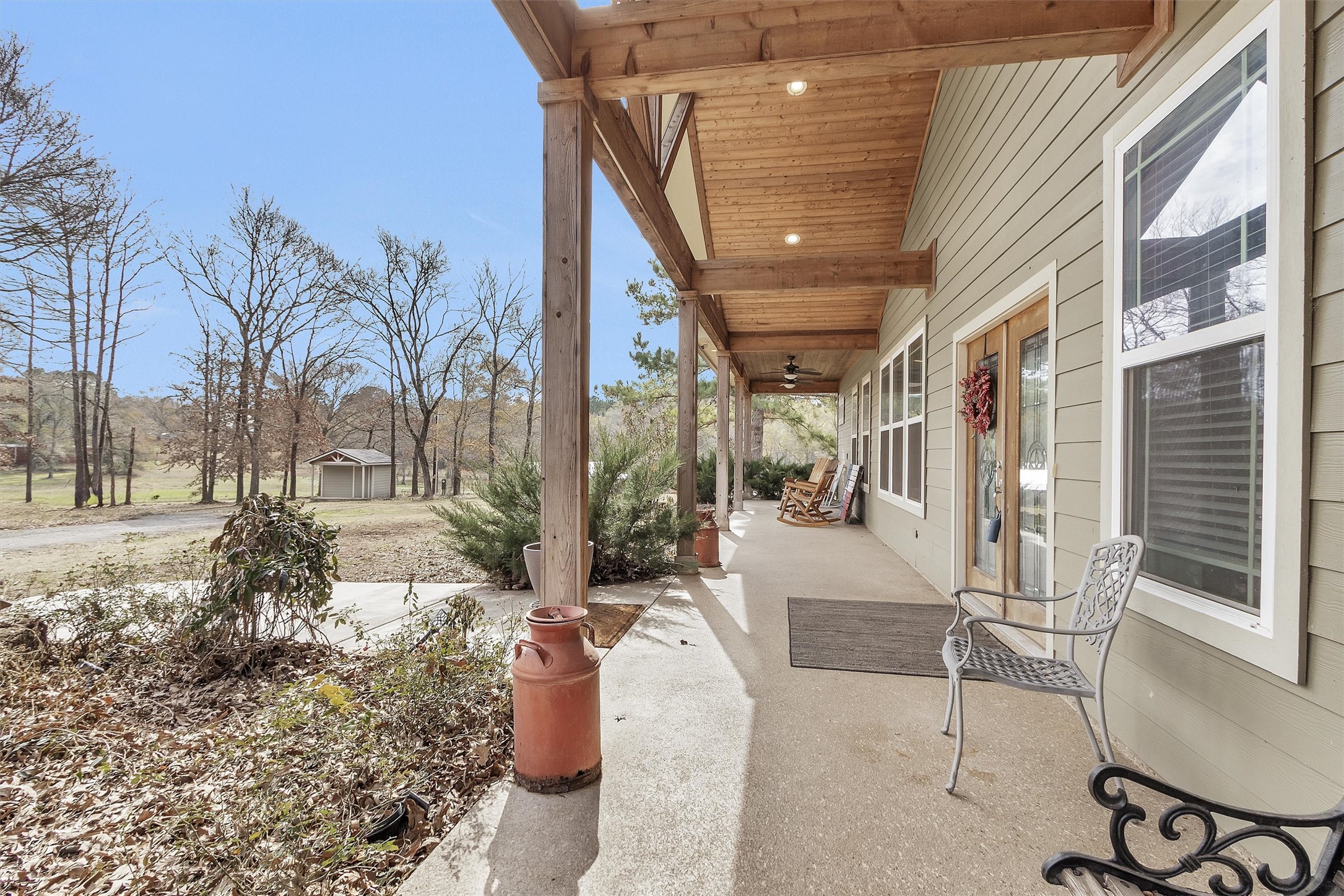 12225 High Fire Road Montgomery, TX 77356 - Photo 6 of 45 a patio with glass top table and chairs