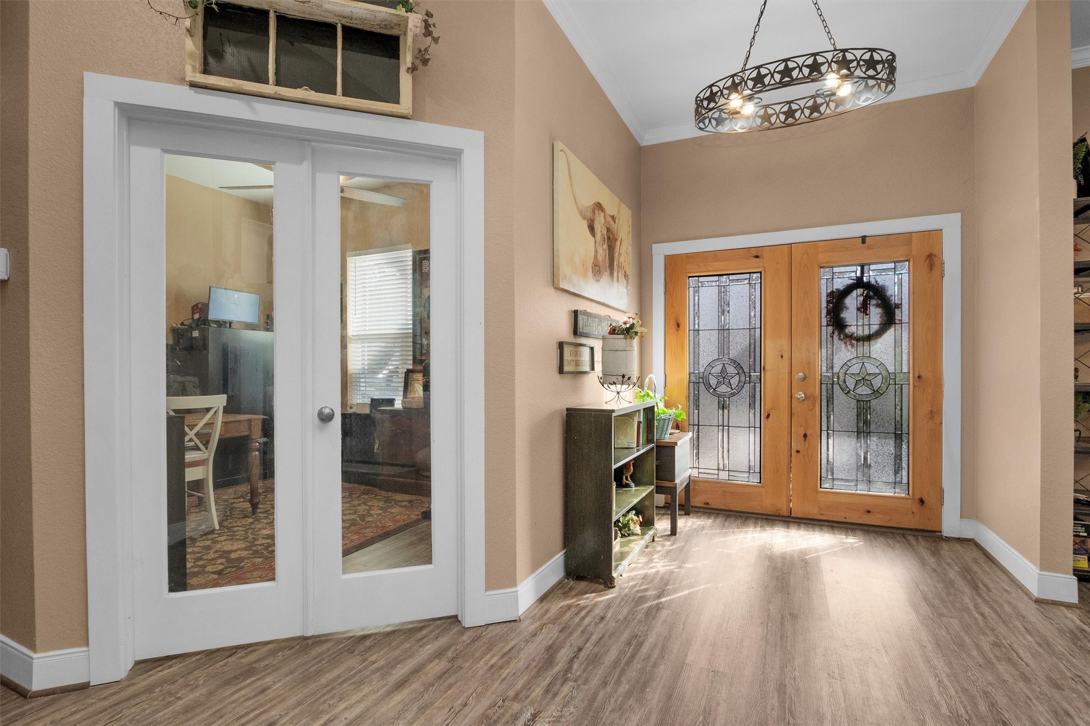 12225 High Fire Road Montgomery, TX 77356 - Photo 8 of 45 a view of a hallway with wooden floor and a living room