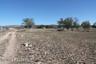 180 West Antelope Run Road Paulden, AZ 86334 - Photo 6 of 11 a view of a dry yard with trees