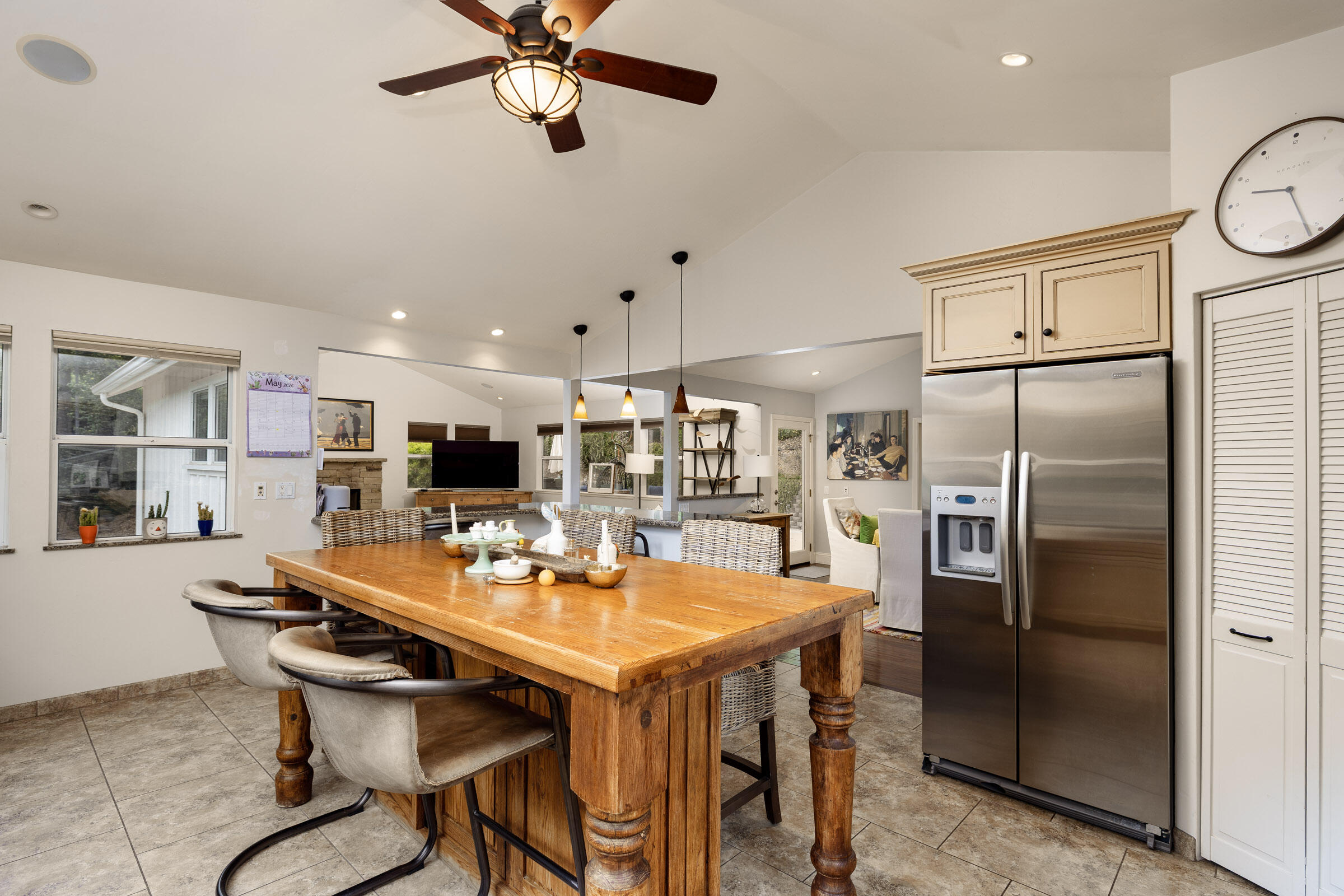 1352 Manitou Road Santa Barbara, CA 93101 - Photo 8 of 27 a dining room with stainless steel appliances kitchen island granite countertop a dining table and chairs