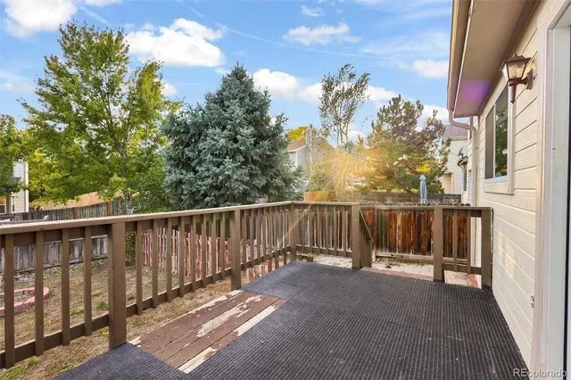 a view of balcony with furniture