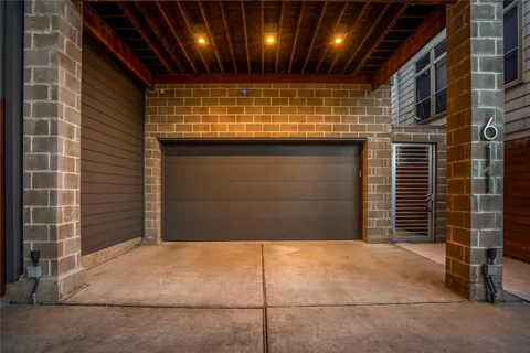 a view of balcony with wooden floor and potted plant