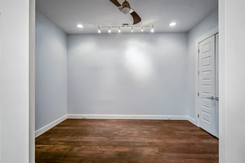 a view of room with gym equipment