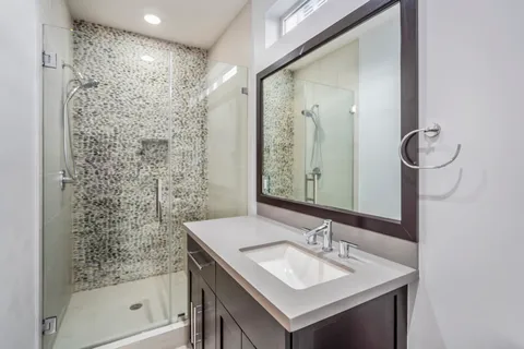 a view of deck door with wooden floor