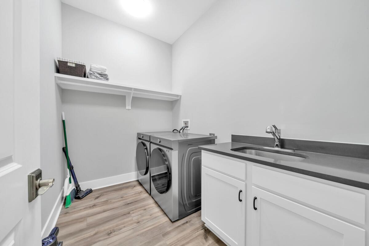 117 River Rise Way Inlet Beach Inlet Beach, FL 32461 - Photo 8 of 12 a utility room with sink dryer and washer