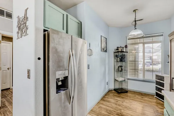 a view of a kitchen from the hallway