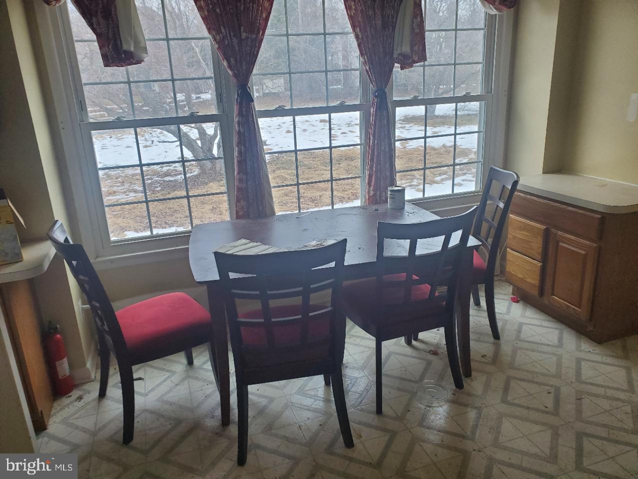 12408 West Old Baltimore Road Boyds, MD 20841 - Photo 4 of 13 a view of a dining room with furniture and window