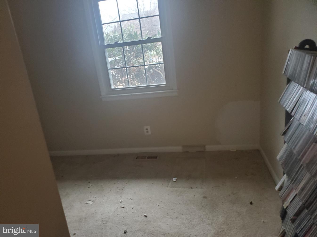 12408 West Old Baltimore Road Boyds, MD 20841 - Photo 8 of 13 an empty room with a window