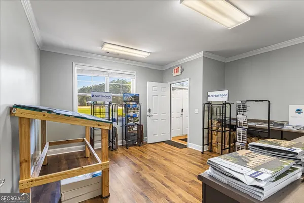 a living room with furniture and a table