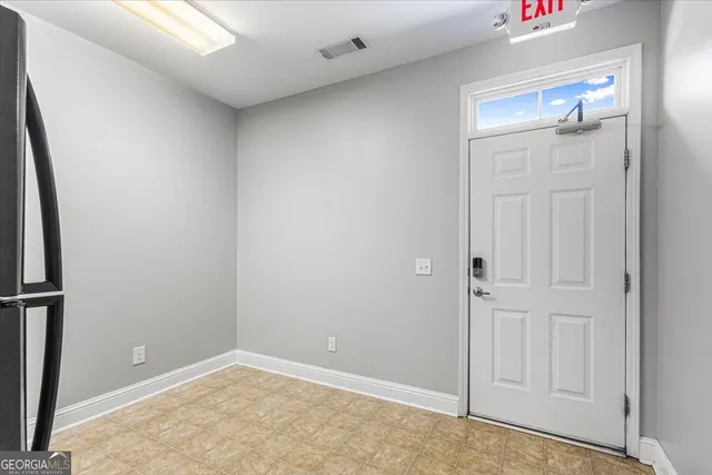 an empty room with cabinet