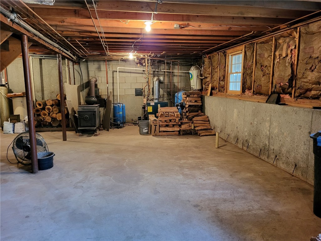 276 Widow Sweets Road Exeter, RI 02822 - Photo 26 of 44 Walk-out with high ceilings and wood stove