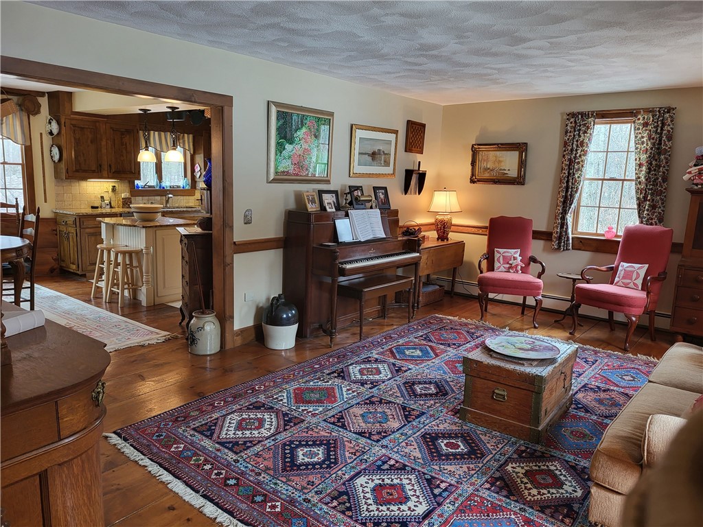 276 Widow Sweets Road Exeter, RI 02822 - Photo 10 of 44 Note the wide plank floors that run through most of the 1st floor