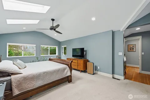 a bed room with a bed and a couch