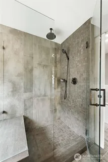 a bathroom with a sink a mirror and a toilet