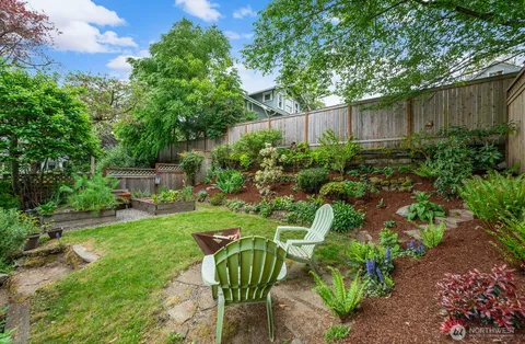 a outdoor living space with furniture and a potted plant