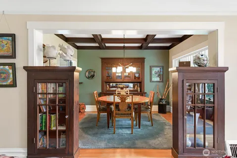 a view of a dining room with furniture window and outside view