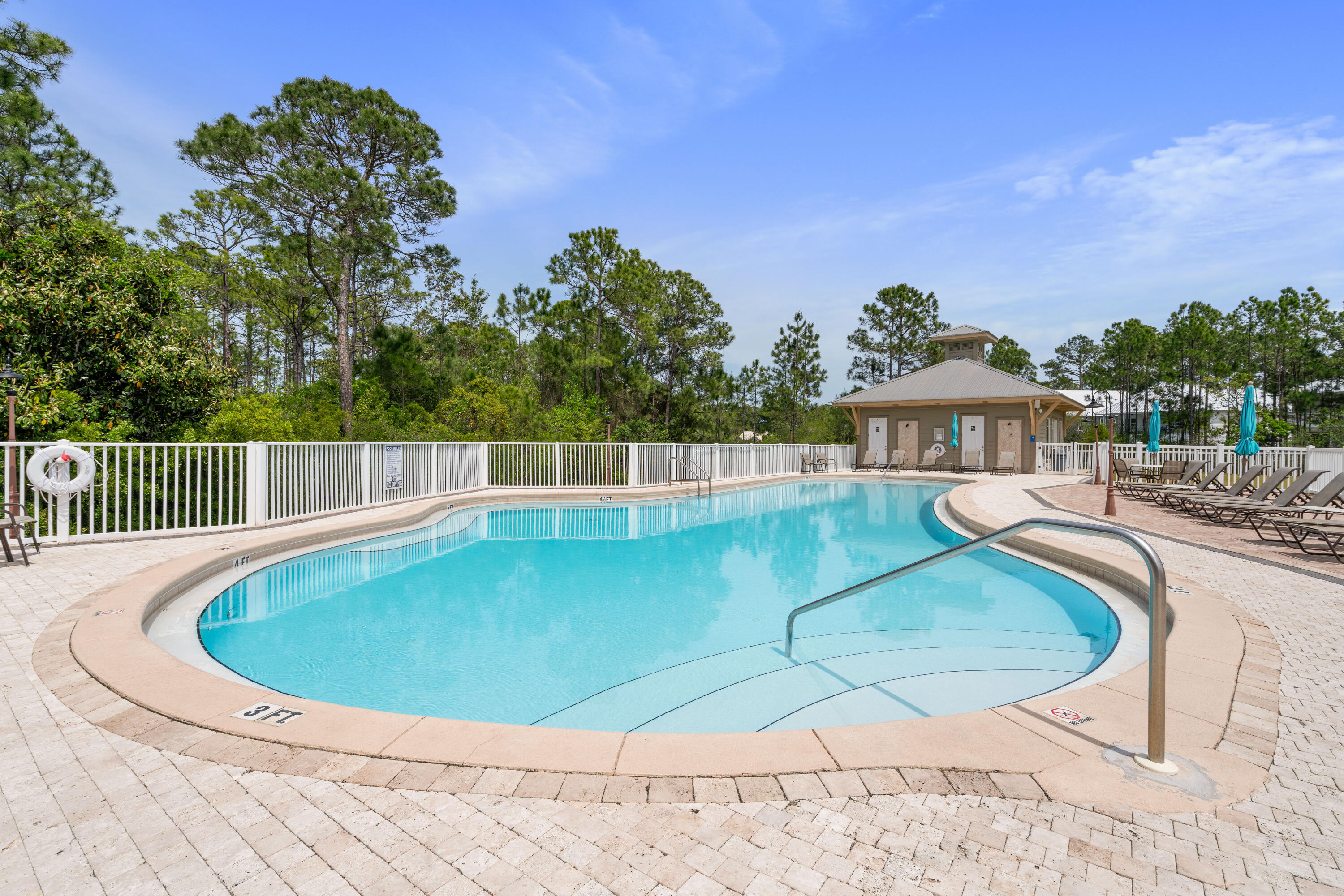 231 Somerset Bridge Road, Unit 2305 Santa Rosa Beach, FL 32459 - Photo 28 of 40 a view of a swimming pool with a yard