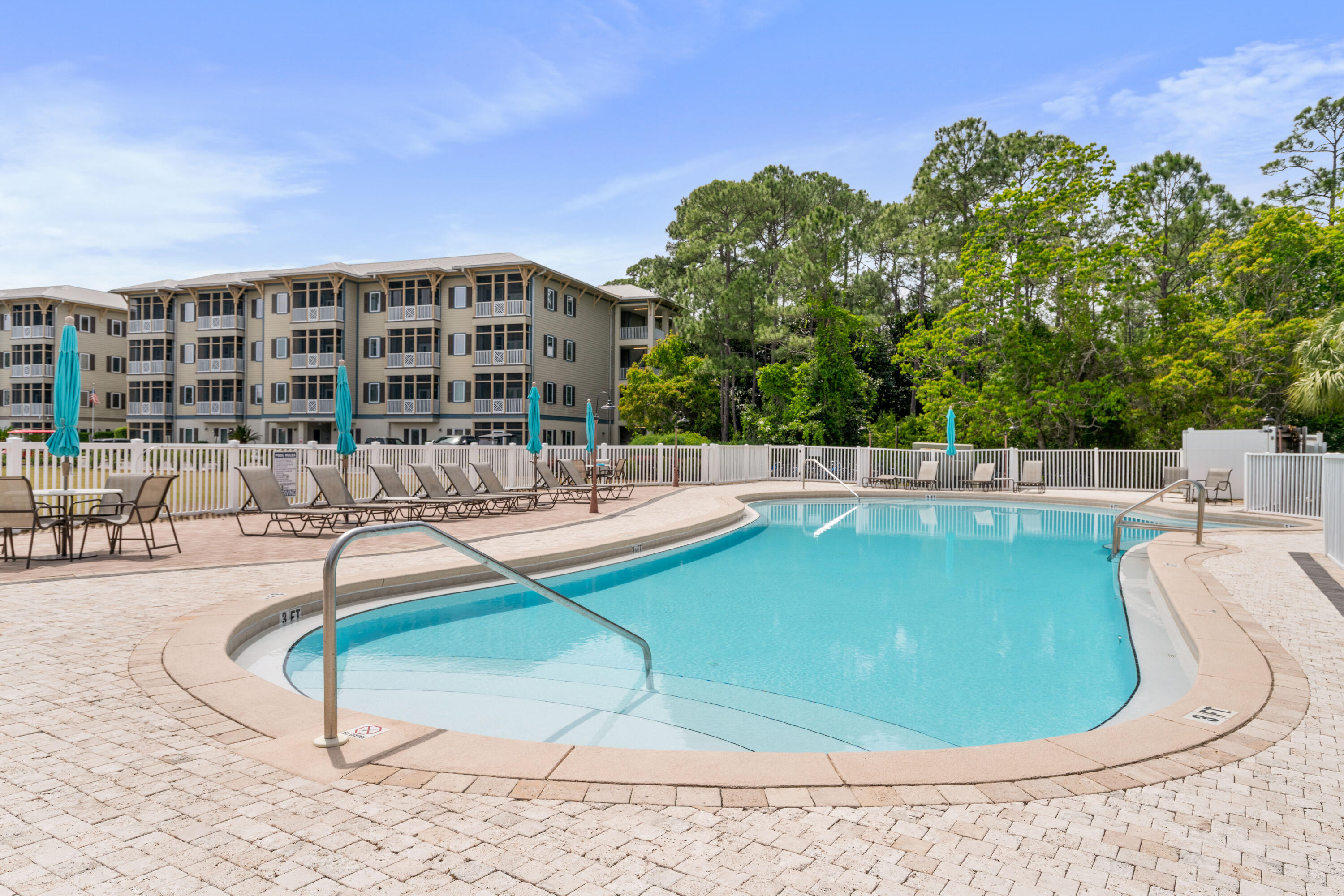 231 Somerset Bridge Road, Unit 2305 Santa Rosa Beach, FL 32459 - Photo 3 of 40 a swimming pool with outdoor seating and yard